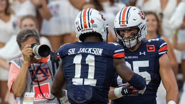 Shedrick Jackson and John Samuel Shenker.